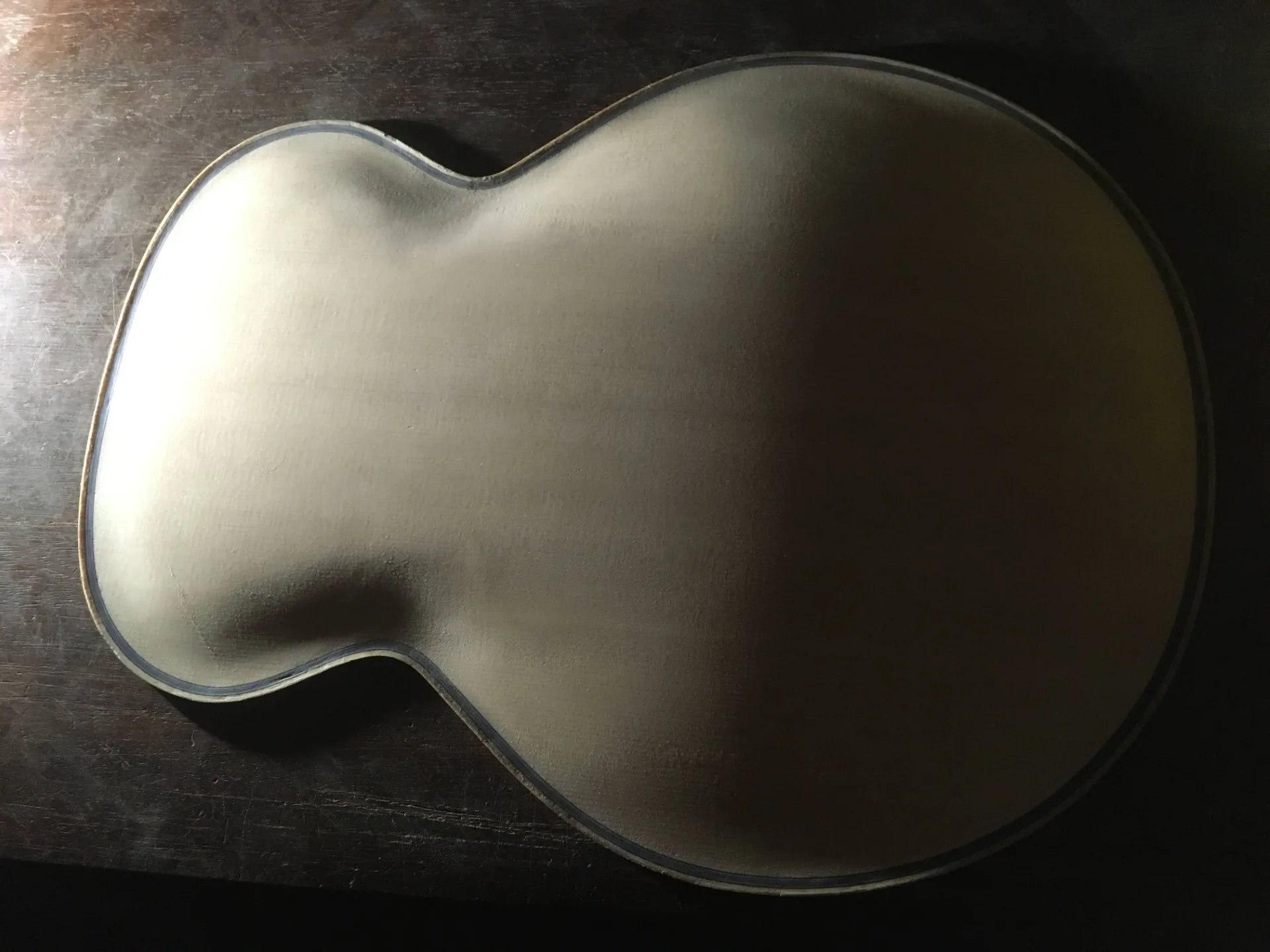 Completely carved archtop plate back view
