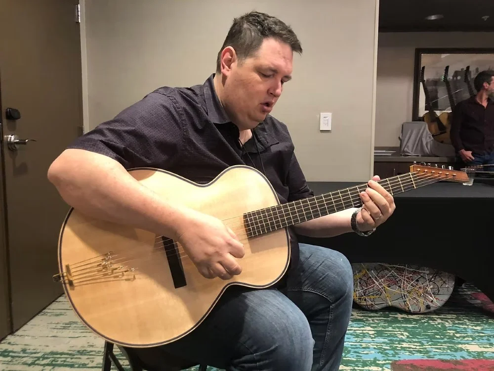 Ted Ludwig playing guitar