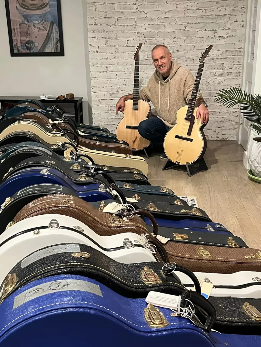 Krzysztof Trześniowski with guitars collection