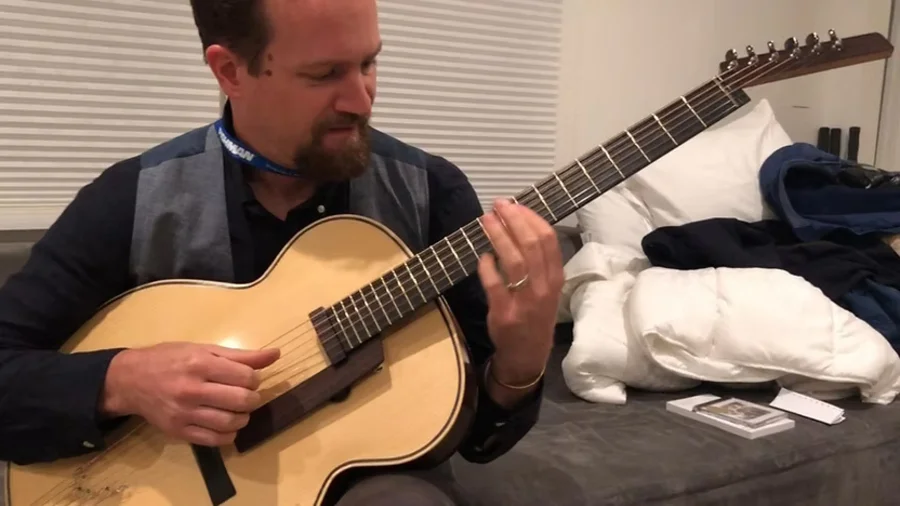 Martin Keith playing guitar